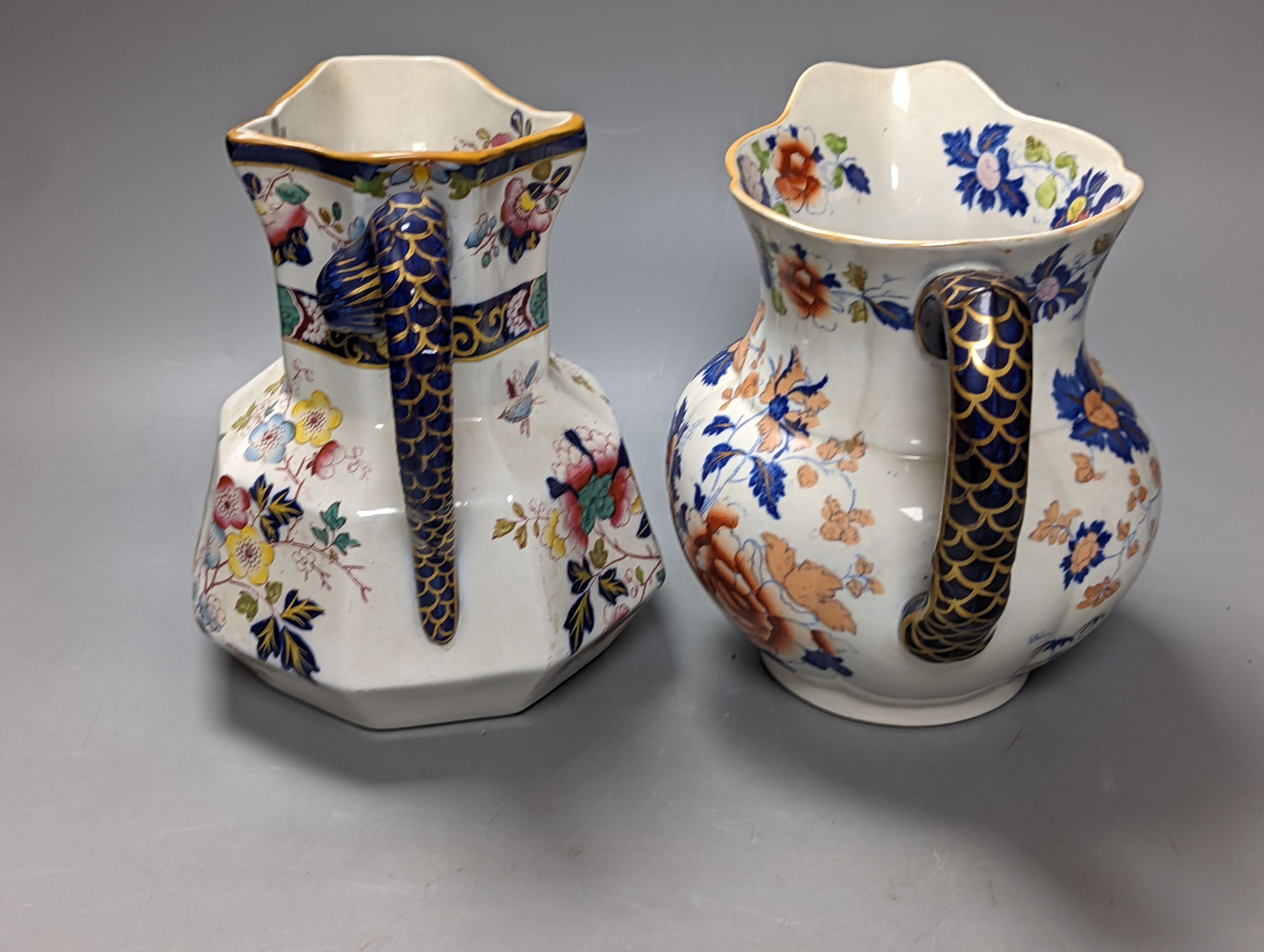 Two Masons jugs, with snake handles, tallest 19 cms high.